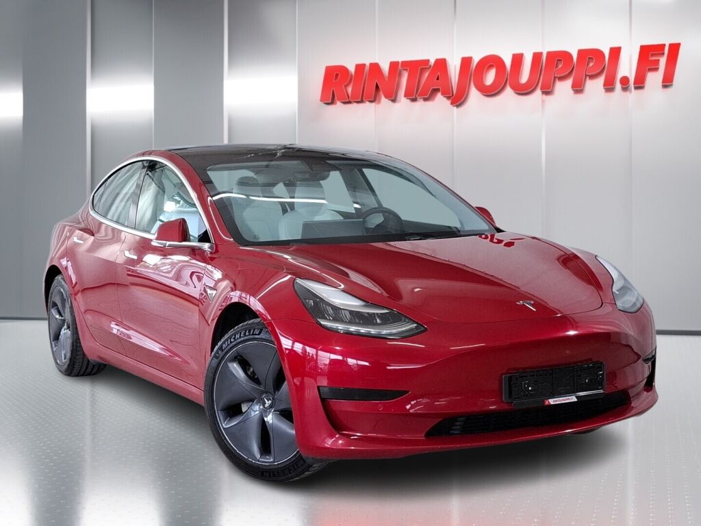 Tesla Model 3 2021 met.punainen